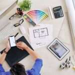 Professional interior designer planning a modern luxury home interior with furniture layouts, lighting design, and space planning solutions.