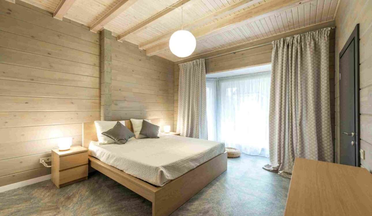 Modern bedroom ceiling design in Vizag with elegant concealed lighting