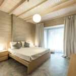 Modern bedroom ceiling design in Vizag with elegant concealed lighting
