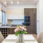Simple kitchen design in Vizag with modern modular cabinets, a stylish countertop, and space-saving storage.