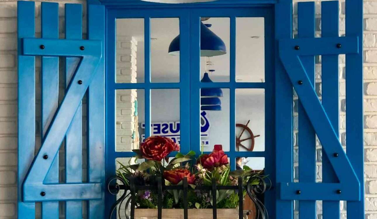 dern window design in Vizag featuring large aluminium-framed windows